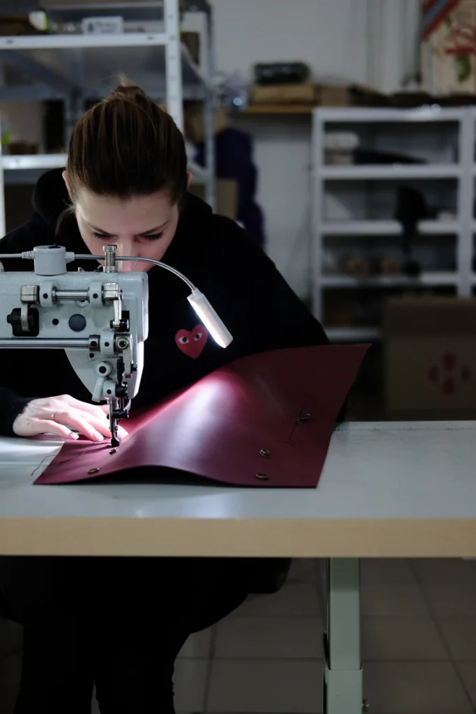 Sewing a leather panel on an industrial sewing machine